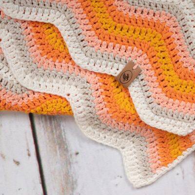 Ripple deken oranje wit close up